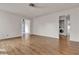 Spacious living room with wood laminate floors and white walls, ready for customization at 5439 Pomeroy Cir, Las Vegas, NV 89142