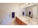Bright bathroom featuring double sinks, ample counter space and updated fixtures at 5449 Bugle Way # 102, Las Vegas, NV 89108
