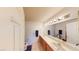 Bright bathroom with double sinks, a large mirror, and modern fixtures at 5449 Bugle Way # 102, Las Vegas, NV 89108