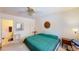 Relaxing bedroom with ensuite bathroom and modern ceiling fan at 5449 Bugle Way # 102, Las Vegas, NV 89108