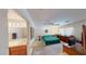 Relaxing bedroom with ensuite bathroom and modern ceiling fan at 5449 Bugle Way # 102, Las Vegas, NV 89108