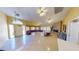 Spacious community area with tile floors, cozy seating, and a stone fireplace at 5449 Bugle Way # 102, Las Vegas, NV 89108