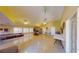 Large community room featuring tile floors, cozy seating, and access to amenities at 5449 Bugle Way # 102, Las Vegas, NV 89108