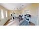 Well-equipped home gym featuring modern exercise machines and a mirrored wall at 5449 Bugle Way # 102, Las Vegas, NV 89108