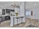 Open layout from living space to kitchen area, great for entertaining guests at 5731 Kona Mountain St, North Las Vegas, NV 89031