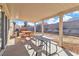 Spacious covered patio featuring two picnic tables, offering an ideal outdoor living and dining space at 5731 Kona Mountain St, North Las Vegas, NV 89031