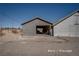 Exterior of barn or storage area with open door under blue sky at 714 Lacy Ln, Las Vegas, NV 89107