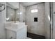 Beautiful bathroom features a vessel sink and a modern walk-in shower with gray tile at 714 Lacy Ln, Las Vegas, NV 89107