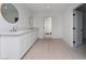 Bathroom featuring long vanity with double sinks and updated faucets at 714 Lacy Ln, Las Vegas, NV 89107