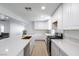 Bright kitchen featuring new countertops, stainless appliances and fixtures at 714 Lacy Ln, Las Vegas, NV 89107