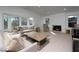 Bright living room with hardwood floors, many windows, and neutral décor at 714 Lacy Ln, Las Vegas, NV 89107