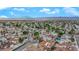 Wide aerial view of a neighborhood with a mountain backdrop and desert landscape at 7274 Pinebrook Cir, Las Vegas, NV 89147