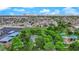 Aerial view of a neighborhood featuring a community park with playground and sports court at 7274 Pinebrook Cir, Las Vegas, NV 89147