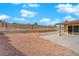 Backyard featuring a large rock area, concrete patio, and block wall fencing at 7274 Pinebrook Cir, Las Vegas, NV 89147