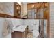 Bathroom features unique wood paneling, tiled floors, and modern fixtures at 7274 Pinebrook Cir, Las Vegas, NV 89147