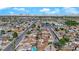 An aerial shot showing neighborhood with skyline in the background at 7274 Pinebrook Cir, Las Vegas, NV 89147