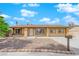 Charming single-story home with a well-maintained gravel front yard and a cozy feel at 7274 Pinebrook Cir, Las Vegas, NV 89147