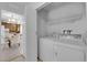 Enclosed laundry area located near kitchen and dining area at 7274 Pinebrook Cir, Las Vegas, NV 89147