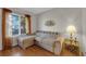 Cozy living room featuring a large window, curtains, and ample seating at 7274 Pinebrook Cir, Las Vegas, NV 89147