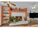 Bright open concept living room with beautiful display shelving at 7274 Pinebrook Cir, Las Vegas, NV 89147