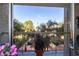 Balcony view overlooking landscaped grounds and mature trees at 730 S Royal Crest Cir # 424, Las Vegas, NV 89169