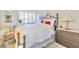 Comfortable bedroom with natural light, neutral decor, and a cozy ambiance, creating a relaxing retreat at 730 S Royal Crest Cir # 424, Las Vegas, NV 89169