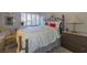 Comfortable bedroom offers natural light, a cozy bed, and ample closet space at 730 S Royal Crest Cir # 424, Las Vegas, NV 89169