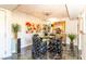 Cozy dining room with a glass-top table, decorative chairs, and stylish lighting, perfect for intimate gatherings at 730 S Royal Crest Cir # 424, Las Vegas, NV 89169