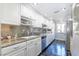 Modern kitchen with stainless steel appliances, ample cabinet space, and stylish countertops, perfect for cooking and entertaining at 730 S Royal Crest Cir # 424, Las Vegas, NV 89169
