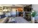 Spacious living area with fireplace, adjacent to the dining area, with sleek, modern finishes at 730 S Royal Crest Cir # 424, Las Vegas, NV 89169