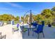Outdoor patio with seating, mature trees, and clear skies in this community at 730 S Royal Crest Cir # 424, Las Vegas, NV 89169