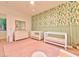 Bedroom with cactus-themed wallpaper and matching trim at 7565 N Torrey Pines Dr # A, Las Vegas, NV 89131