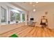 Bright office with hardwood floors, a bay window, and modern furnishings at 7565 N Torrey Pines Dr # A, Las Vegas, NV 89131