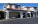 Beautiful condominium exterior with carport and a hint of landscaping at 8455 W Sahara Ave # 226, Las Vegas, NV 89117