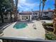 Relaxing hot tub and lounge area with desert landscaping at 8455 W Sahara Ave # 226, Las Vegas, NV 89117