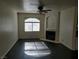 Inviting living room featuring a fireplace and ample natural light at 8455 W Sahara Ave # 226, Las Vegas, NV 89117