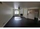 Open living room with fireplace and view of the kitchen at 8455 W Sahara Ave # 226, Las Vegas, NV 89117