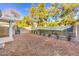 Gravel backyard with secure block wall and metal privacy screening offers a serene outdoor space at 908 Majestic Oak St, Las Vegas, NV 89145