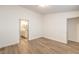 Bright bedroom with ensuite bathroom and wood flooring at 908 Majestic Oak St, Las Vegas, NV 89145