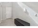 Clean and bright entryway featuring neutral walls, tile floors, and a modern storage unit at 9690 Hiking Ave, Las Vegas, NV 89166