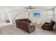Cozy living room featuring neutral walls, plush carpeting, and comfortable seating at 9690 Hiking Ave, Las Vegas, NV 89166