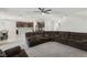 Open-concept living room seamlessly connecting to the kitchen and dining area at 9690 Hiking Ave, Las Vegas, NV 89166