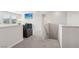 Upstairs loft featuring plush carpeting and a comfortable seating area at 9690 Hiking Ave, Las Vegas, NV 89166