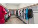 Spacious walk-in closet with ample hanging space for clothes and accessories at 9690 Hiking Ave, Las Vegas, NV 89166