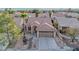 Charming single-story home with a tile roof, desert landscaping, and a two-car garage at 9741 Panorama Cliff Dr, Las Vegas, NV 89134