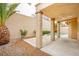 Covered patio with a ceiling fan and view of the pool and landscaped backyard at 9741 Panorama Cliff Dr, Las Vegas, NV 89134