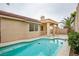 In-ground backyard swimming pool and covered patio at 9741 Panorama Cliff Dr, Las Vegas, NV 89134