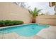 A beautiful backyard pool is surrounded by lush landscaping, offering a private oasis at 9741 Panorama Cliff Dr, Las Vegas, NV 89134