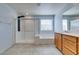 Modern bathroom with a glass-enclosed shower, soaking tub, and sleek fixtures at 981 Soaring Moon Dr, Henderson, NV 89015