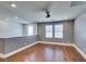 Open bonus room offers hardwood floors, natural light, and neutral paint throughout at 981 Soaring Moon Dr, Henderson, NV 89015